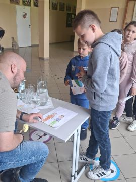 Obrazy news&oacute;w: spotkanie_z_autorem_5.jpg